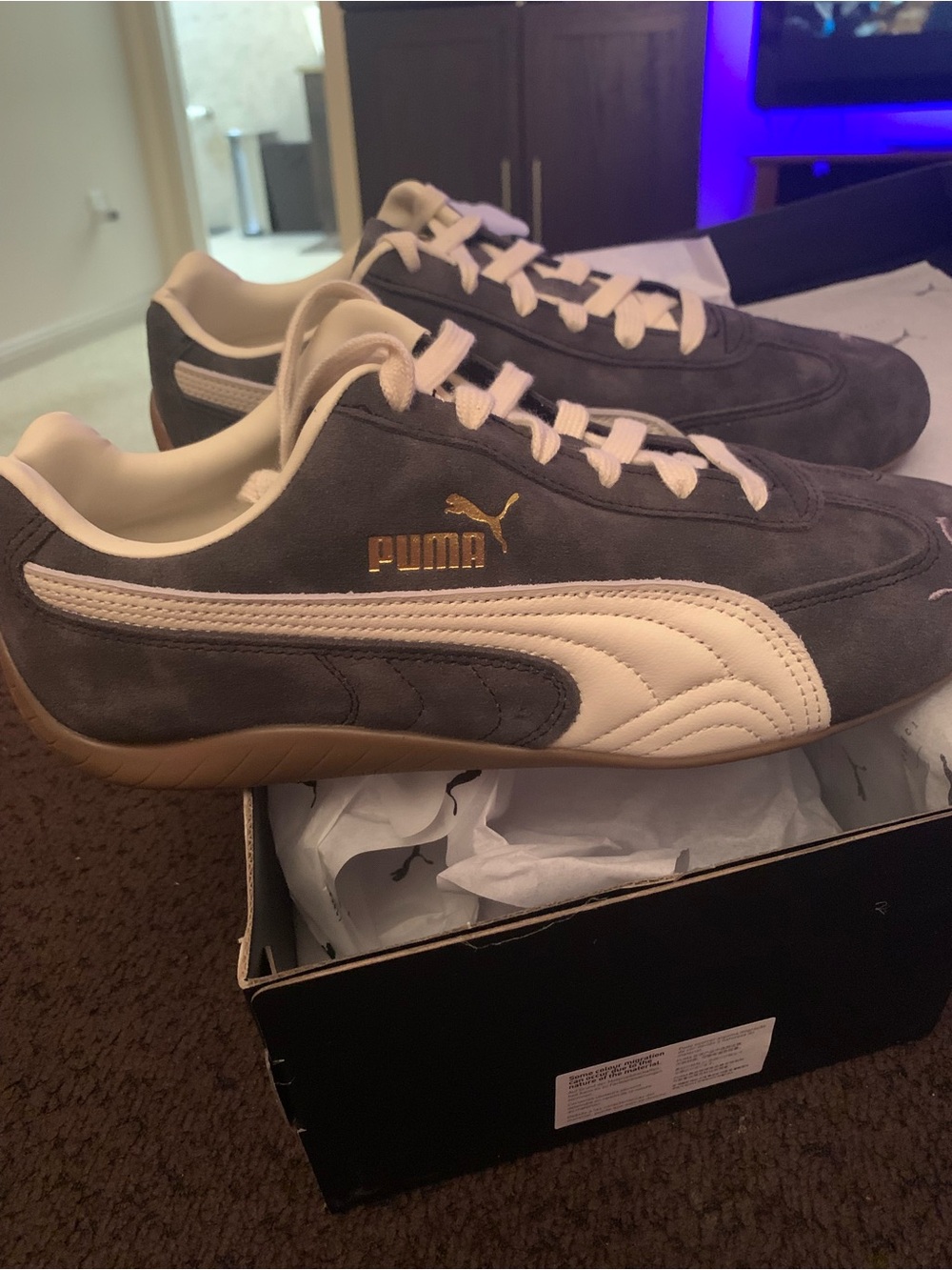 Puma Gray Suede Sneakers with White Stripe and Gold Logo